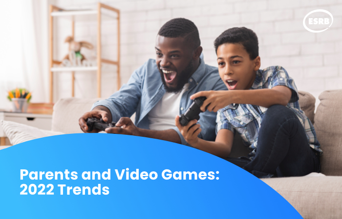 Parent and child playing video games with text reading Parents and Video Games: 2022 Trends