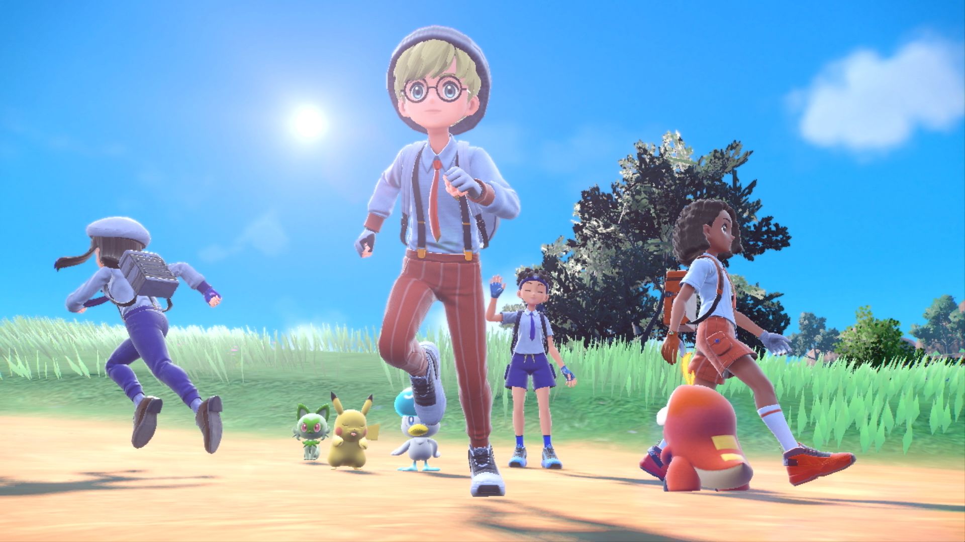 A group of four of in-game trainers (controlled by real players) exploring the Paldea region together online. The trainers are running in a field joined by their starter Pokémon.